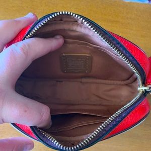 Beautiful like new Coach/Marvel; featuring Captain Marvel, One zipper purse.